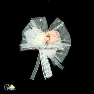 گل تزئینی پارچه‌ای دست‌ساز با طراحی خاص و رنگ‌های لطیف، مناسب برای تزئین لباس، گیره مو و دکور جشن. خرید آنلاین با بهترین کیفیت از هنری آنلاین